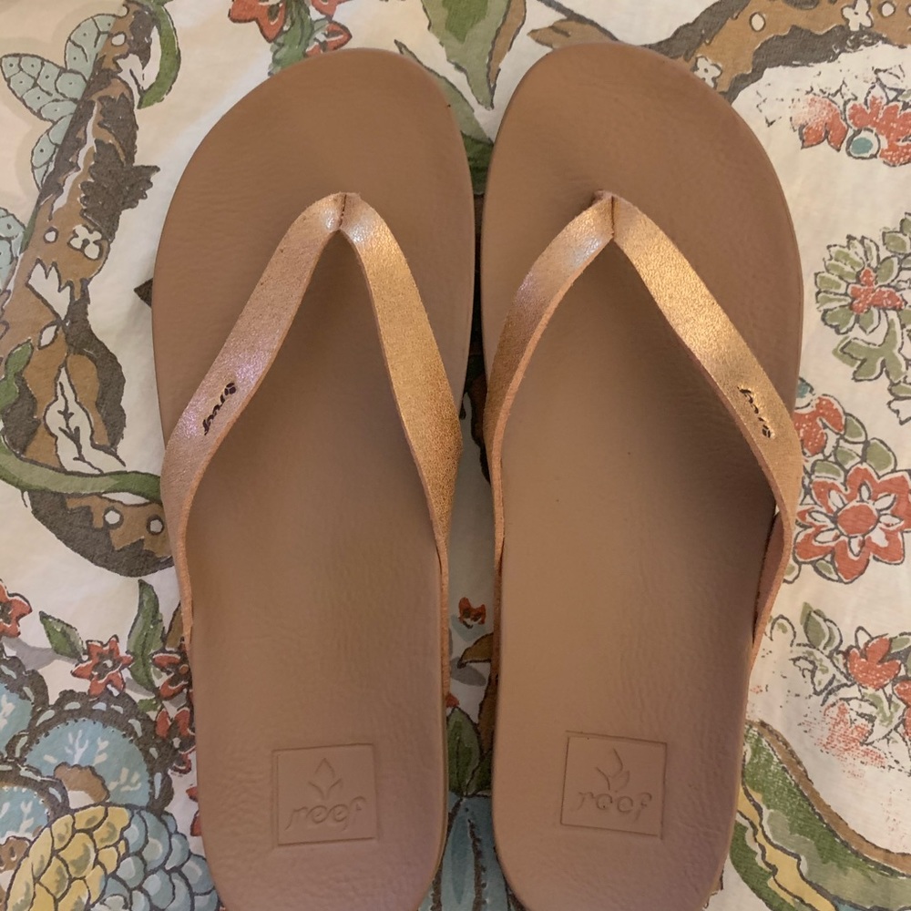 Reef women’s rose gold flip flops